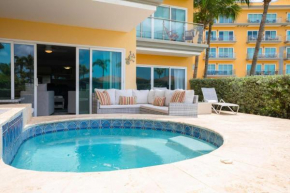 Beachfront - Garden Delight 2BR condo - E125-2